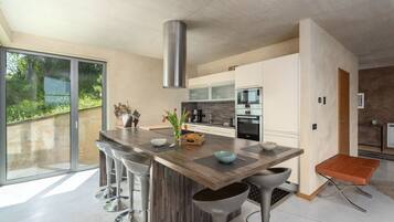 Villa | Private kitchen | Fridge, microwave, oven, stovetop