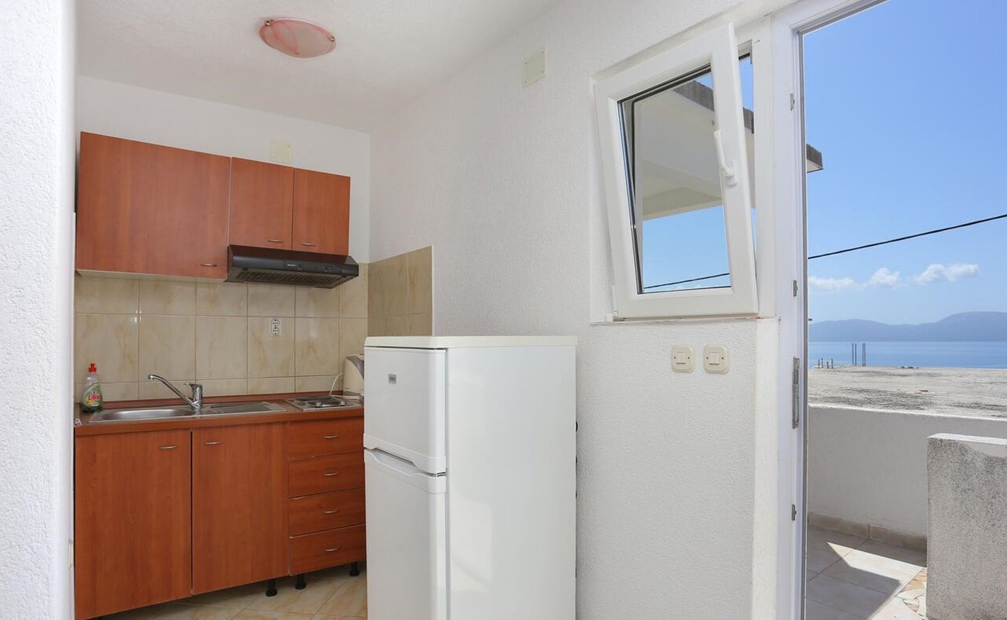 Apartment (A3) | Eigene Küche | Kühlschrank, Herdplatte, Wasserkocher, Kochgeschirr/Geschirr/Besteck