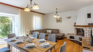 Villa | Living room | Fireplace, DVD player