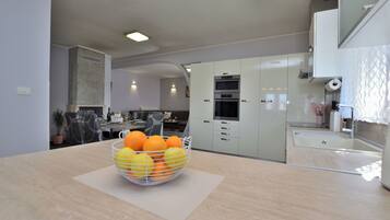 Villa | Private kitchen | Fridge, microwave, oven, stovetop