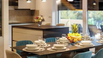 Villa | Private kitchen | Fridge, microwave, oven, stovetop