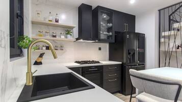 Villa | Private kitchen | Fridge, microwave, oven, stovetop