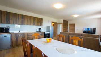 Villa | Private kitchen | Fridge, microwave, oven, stovetop