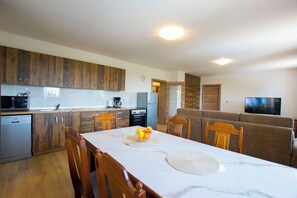 Villa | Private kitchen | Fridge, microwave, oven, stovetop
