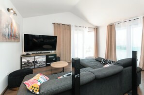 Villa | Woonkamer | Smart-tv