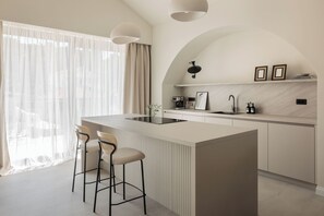 Villa | Private kitchen | Fridge, microwave, oven, stovetop