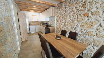 Villa | Private kitchen | Fridge, microwave, oven, stovetop