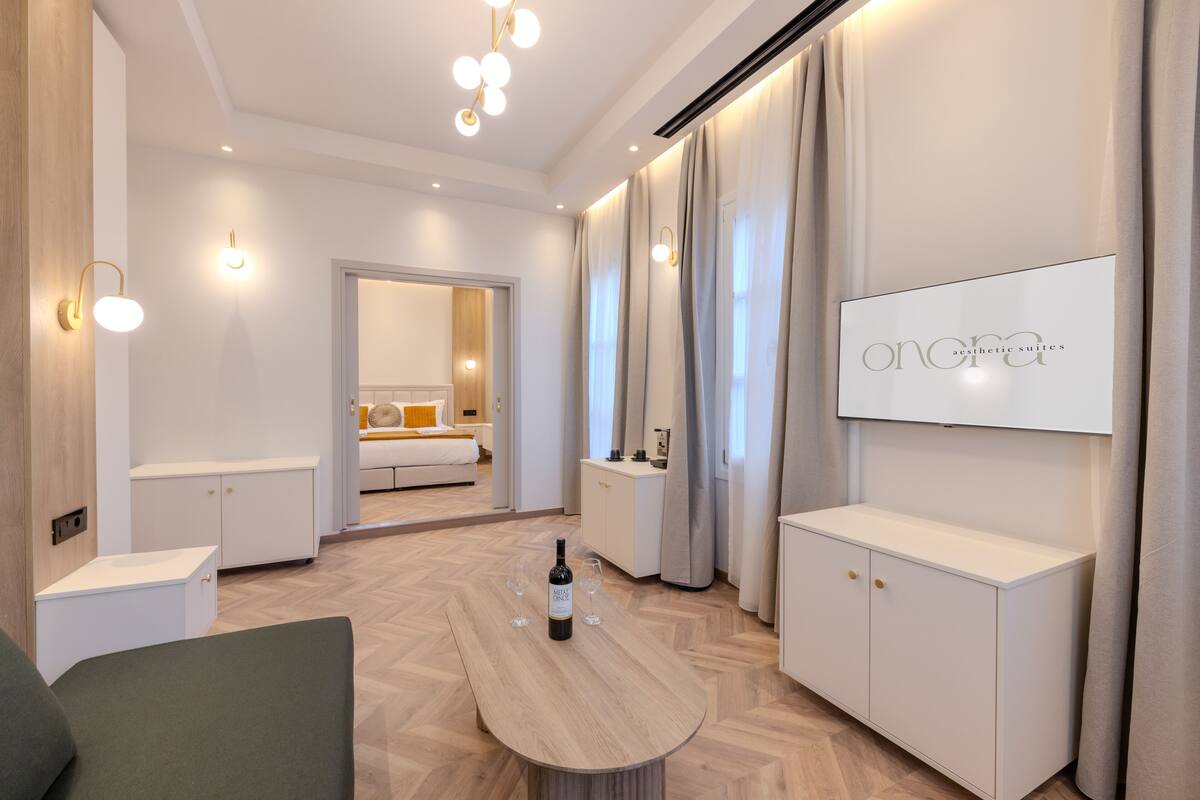 Executive Suite, Non Smoking, City View | Living area | TV