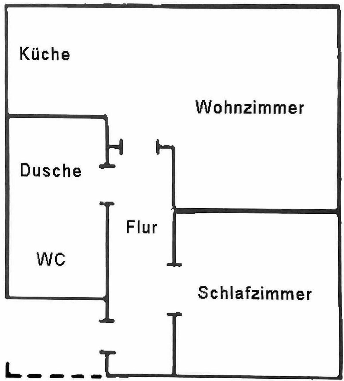 A floor plan with a kitchen, living room, bathroom, and WC.
