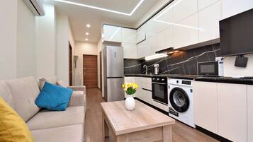 Bloc d'apartaments, vistes a la ciutat | Cuina privada