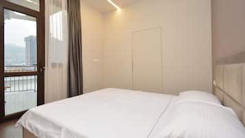 Condo, City View | Blackout drapes, iron/ironing board, free WiFi