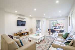 Apartment | Living room - Spacious Flat With Parking & Dedicated EV Station (Batemans Bay)