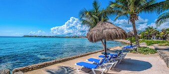 Poolside Garden Villa with Terrace & Beach Access
