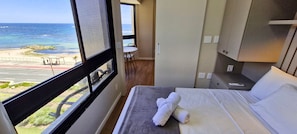 Apartamento | Wi-Fi de cortesia, roupa de cama