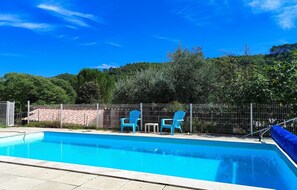 Casa | Piscina | Una piscina cubierta, una piscina al aire libre