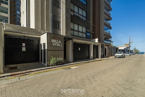 A modern building with a storefront labeled "Bella Vita." - Apt w/ Bbq, 80m From the Beach Ret0801 (Picarras)