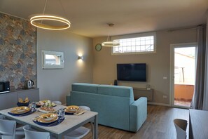 Deluxe Apartment, Lake View | Living area | 50-inch flat-screen TV with digital channels, heated floors - Borgo Predeschera (Lonato del Garda)