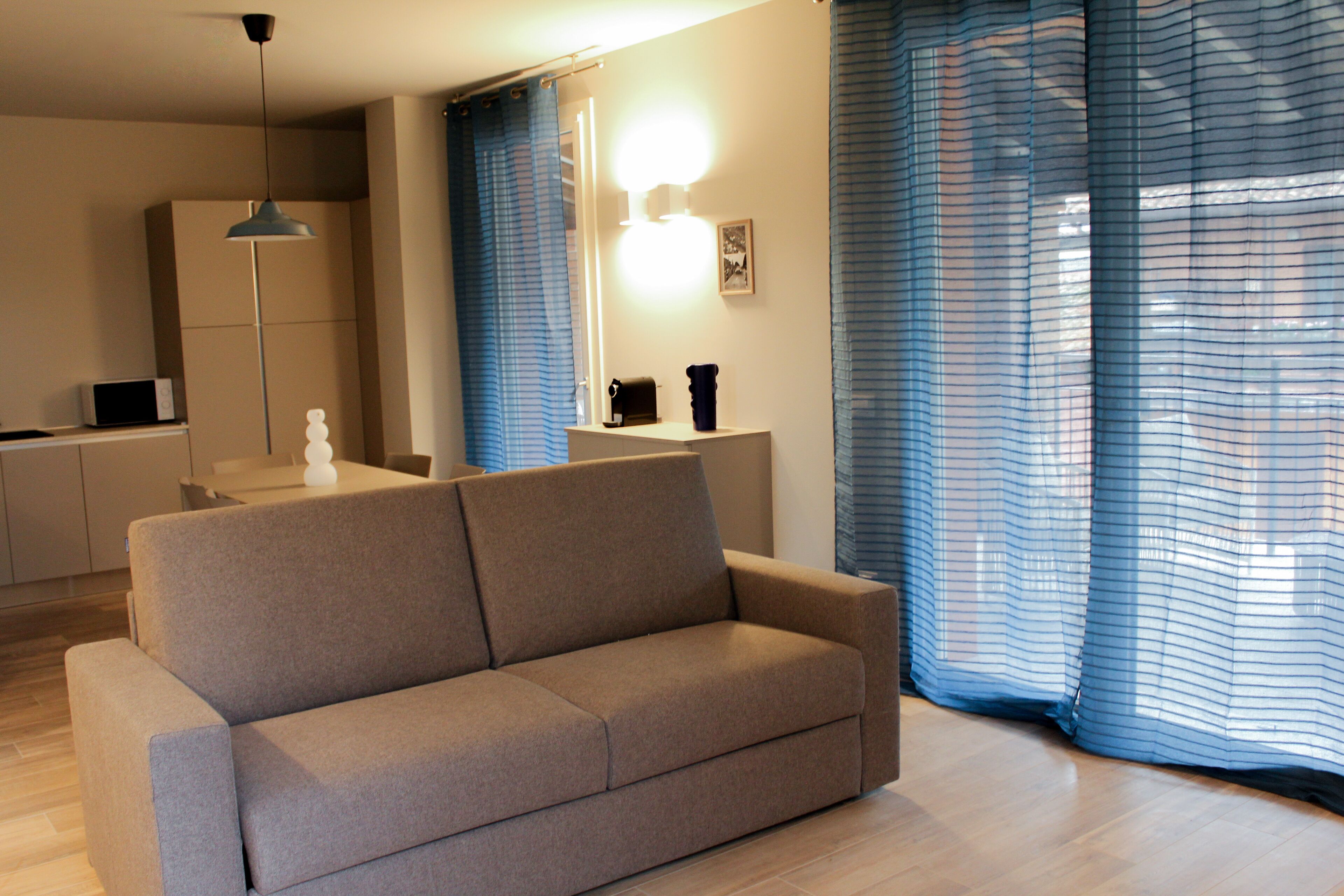 Comfort Apartment | Living area | 50-inch flat-screen TV with digital channels, heated floors