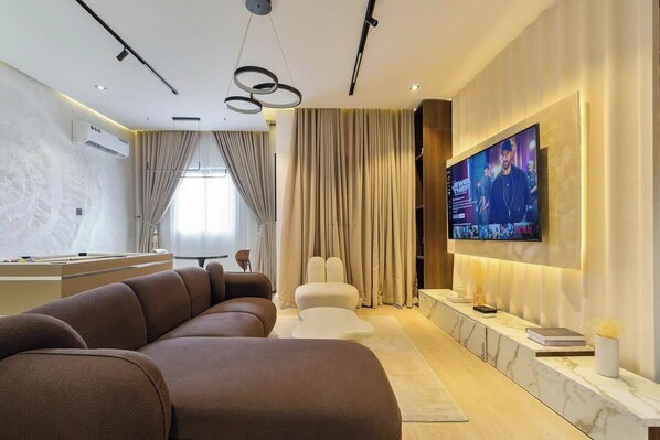 Lägenhet Deluxe - balkong - utsikt mot staden | Vardagsrum