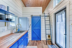 Fridge, microwave, coffee/tea maker, cookware/dishes/utensils - Santorini-Style Tiny Home | Cobalt Blues, Fire Pit & Hill Country Stars (Blanco)