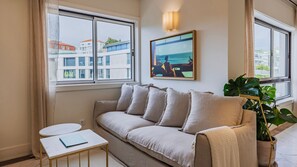 TV, fireplace - Estoril Upscale Apartment w/ Pool by LovelyStay (Estoril)