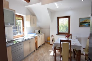 Fridge, microwave, stovetop, high chair