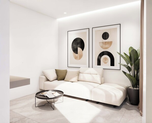 Deluxe Quadruple Room | Living area