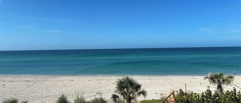 On the beach, sun loungers, beach towels
