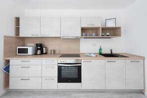 Private kitchen - Quiet, beachfront Anker vacation apartment with terrace by the city forest (Kühlungsborn)