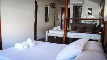 Suíte conforto, vista para a praia | Wi-Fi de cortesia, roupa de cama