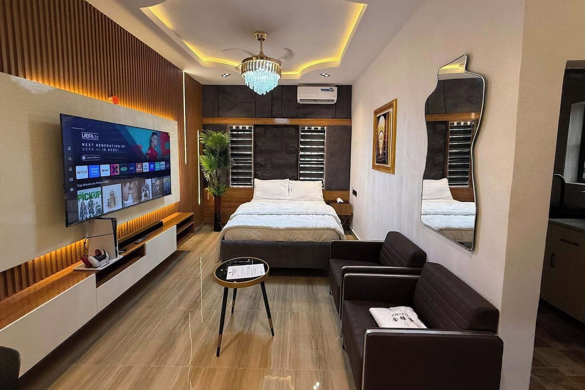 Family Room, Balcony, City View | Desk, laptop workspace, blackout drapes, soundproofing