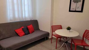 Living area - 1BR Pool & Lagoon View in Condado! (San Juan)