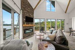 TV, fireplace - Douglas Lake retreat w/ private dock lake access, indoor pool, hotub & firepit (Sevierville)