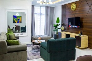 Superior Apartment, Balcony, City View | Living area | Flat-screen TV - Naya's Apartment (Abuja)