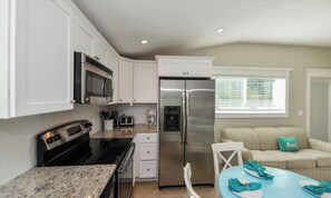 Microwave, oven, stovetop, dishwasher - Beautiful ground level home with heated pool! (Holmes Beach)