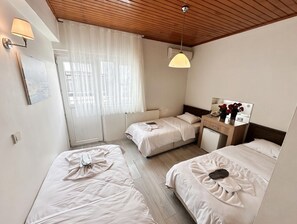 Desk, laptop workspace, free WiFi, bed sheets