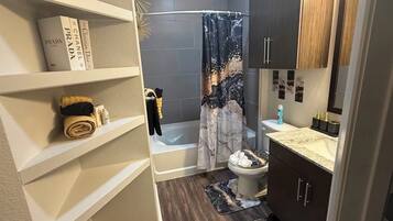 Hair dryer, towels, soap, toilet paper