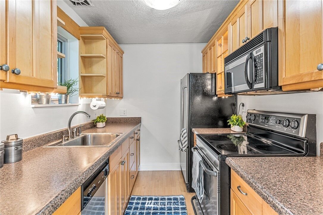 Microondas, horno, parrilla de estufa y lavavajillas 