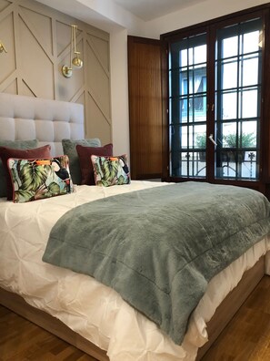 Fer et planche à repasser, lit parapluie, Wi-Fi gratuit, draps fournis