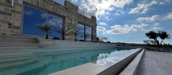 5-bedroom villa in peaceful Mġarr Malta with pool, hot tub, views & gardens