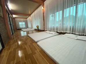 Family Shared Dormitory, Multiple Beds, Garden View | Premium bedding, down comforters, memory foam beds - Thung Din Homestay (Nho Quan)