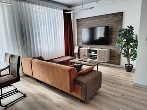 Appartement, 2 chambres, accessible aux personnes à mobilité réduite, vue ville | Coin séjour