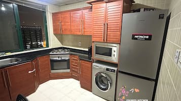 Kamar Double Ekonomi, balkon, pemandangan kota | Dapur bersama | Kompor