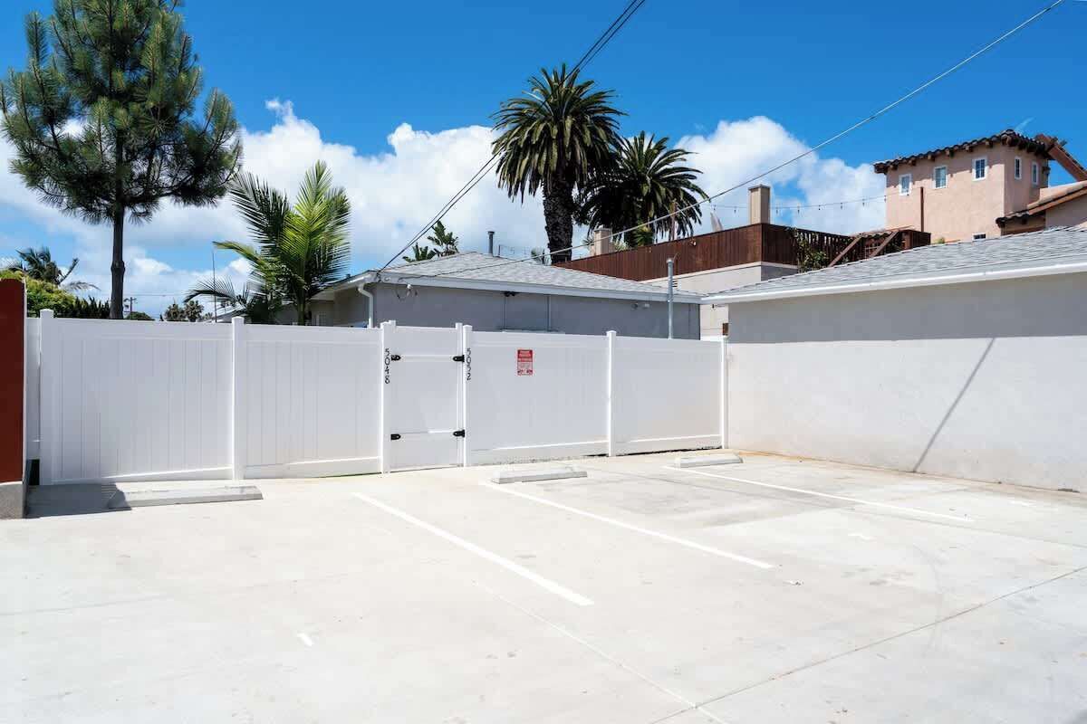 Free parking is included in the alley at the side of the property