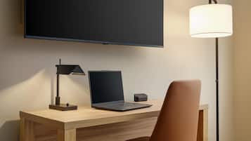 Desk, blackout drapes, iron/ironing board (on request), cribs (free)