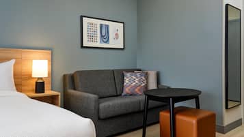 Desk, blackout drapes, iron/ironing board (on request), cribs (free)