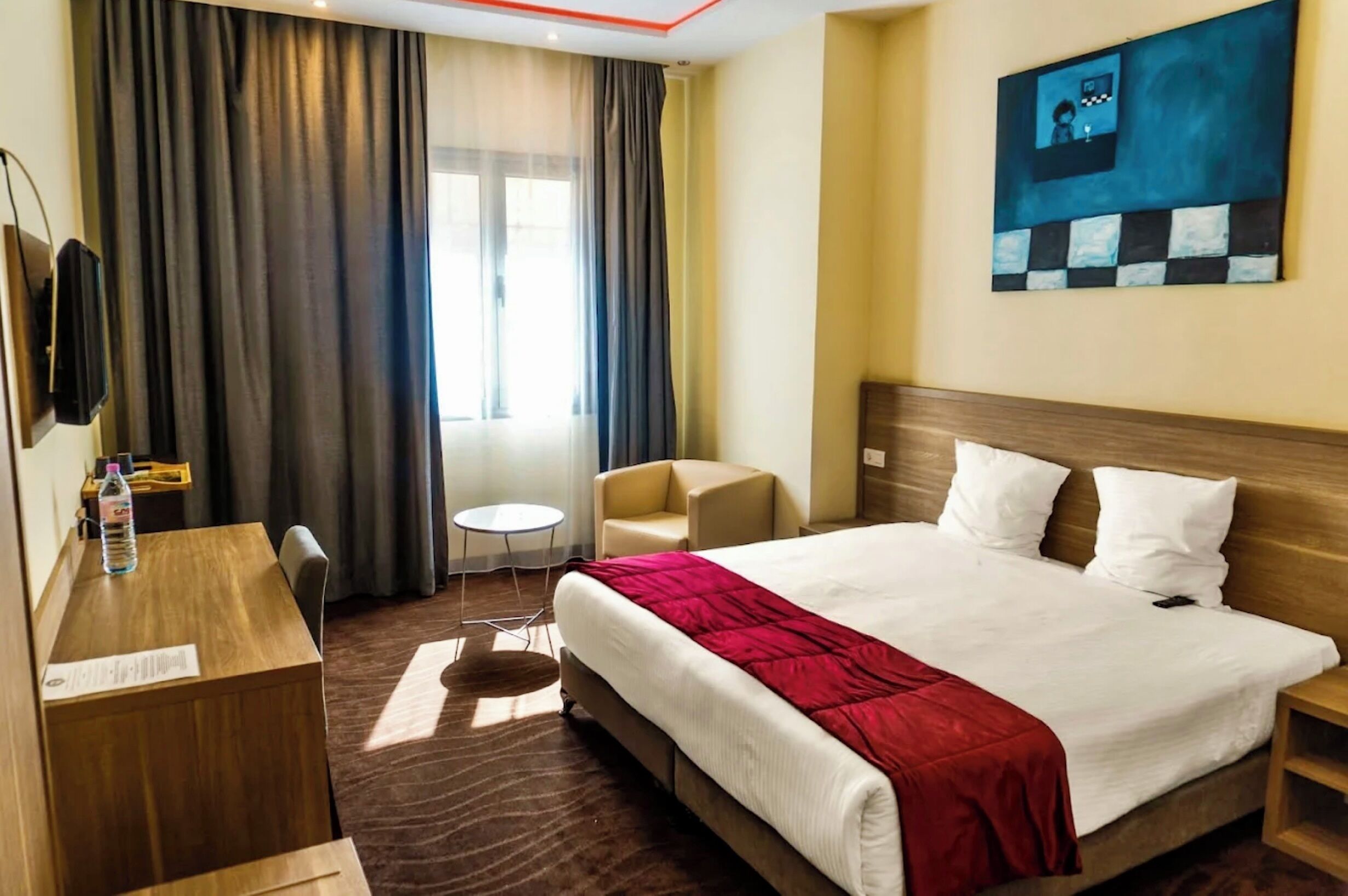 Standard Double or Twin Room | In-room safe, desk, laptop workspace, blackout drapes