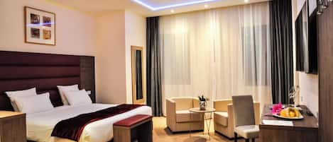 Standard Double or Twin Room | In-room safe, desk, laptop workspace, blackout drapes