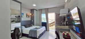 Apartamento | Wi-Fi de cortesia, roupa de cama