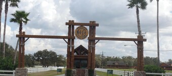 GLAMPING at its finest. Water front, shaded, private dock, river and lake access